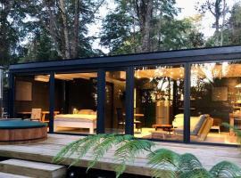 Calma Cabins, hotel em Puerto Clocker