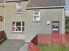 Cosy flat, Scalloway, allotjament amb cuina a Scalloway