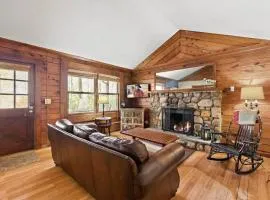 Picturesque Riverside Cabin with Fireplace and Porch