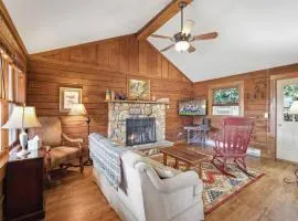 Log cabin on peaceful river