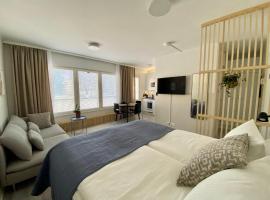 Cozy City Apartment with Parking space and WiFi