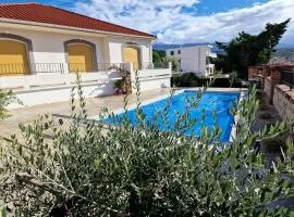 Seaside family friendly house with a swimming pool Barbat, Rab - 22081