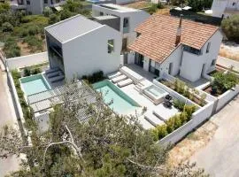 2 sea view Villas as 1 by Chania Living Stories