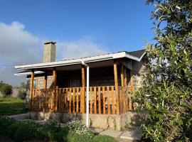 Warm and Inviting Mountain Cottage, atostogų namelis mieste Naro Moru