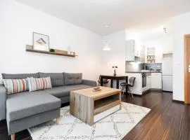 ALURE RESIDENCES 3 & 24h self check-in, parking in the garage in the apartment building included, new building, terrace, green location with a forest park with a lake, children's playground