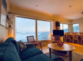 Ski in ski out lägenhet med fantastisk utsikt, מלון בRiksgränsen