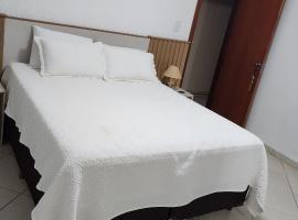 Quartos no Apartamento Neves, homestay in Araxá