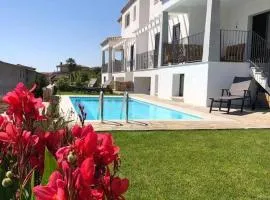 Villa con piscina Vista mare 12 posti letto by budoni affitti
