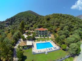 Vliho Bay Suites & Apartments, hotel boutique en Yenion