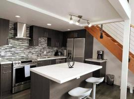 Modern top-floor 1-bedroom loft with free parking, self catering accommodation in Vancouver