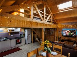 Spacious Log Cabin with Parking near Cambridge, porodični hotel u gradu Kembridž