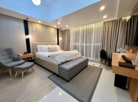 Hotel Vibe Condo at Uptown Parksuites BGC、マニラのアパートホテル