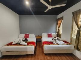 1 Hati Homestay Sepang, habitación en casa particular en Sepang