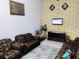 Homestay D'Murni, жилье для отдыха в городе Kampung Gurun