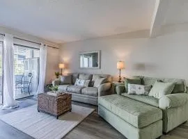 First Floor Condo - Walking distance to beach and pools!