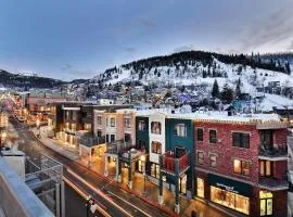 Contemporary Custom Condo Paired with the Best Location in the Center of Main Street. Walk to Ski.