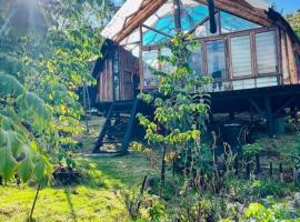 Ecocasa del Encuentro: única y confortable, rumah liburan di La Calera
