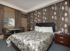 Grand Manor Motor Inn, motel en Queanbeyan