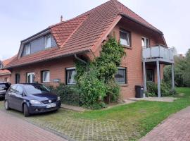 Balkonwohnung Leuchtturm, hotell i Hooksiel