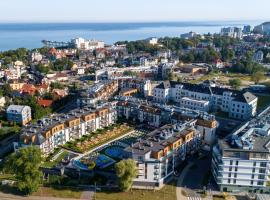 Bel Mare Holiday Apartments near the Beach with PARKING by Renters, apart-hotel em Międzyzdroje