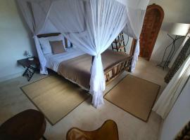 Triple Bedroom in Countryside Villa, viešbutis mieste Usa River