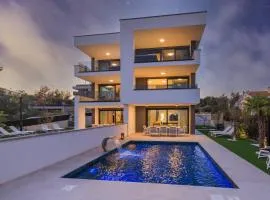 Deluxe villa with heated pool, whirpool, sea view, beautiful beach IV - by Traveler tourist agency Krk ID 2403