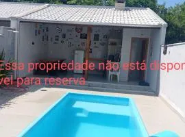 Casa c/ piscina próximo a praia do Grant Itajuba