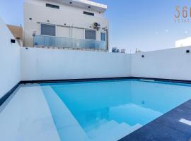 The Swieqi Poolside Suites, hotel in Is-Swieqi