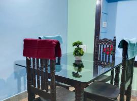Colourful Homestay, alojamiento con cocina en Madikeri