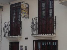 Hostal la Lomita, готель у місті Попаян