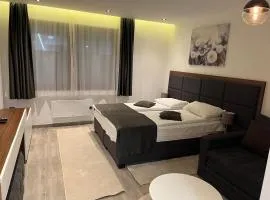 Apart Hotel & spa Zoned II, Kopaonik, apartman Lukač - special benifit Children up to 17 of age accompanied by two adutls staj for free! FREE PARKING!