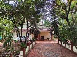 Opera Homestay, hotel i Kollam