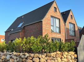 Ferienhaus Fischerstuuv, Hotel in Carolinensiel