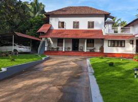 HILL TOP HOMES, bed & breakfast i Kannur
