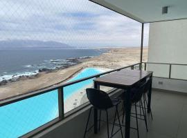 Departamento Antofagasta. Playa privada, hotel with parking in La Chimba