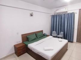 PLUTO HOMES – hotel w mieście Greater Noida
