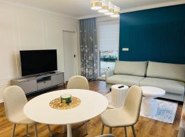 Apartamenty Sosnowe przy Basenach Tropikalnych, Ładowarka do elektryków, Faktura, Parking, hotel en Kielce