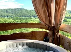 Holiday home with hot tube, near the river