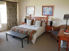 Everglades Hotel & Conference Centre, хотел в Gomane