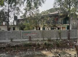Prakrity Village Resort Sundarbans, hotel amb aparcament a Gosāba