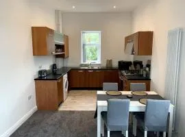 New large 2 bedroom apartment with private parking