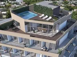 Lujoso Penthouse a estrenar en Sofisticado Barrio y Edificio Vista panorámica 100m2 Gimnasio Piscina Lujoso Salon de Fiestas Parking privado con acceso directo al departamento
