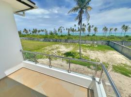 Tropical Gem: 3-BR Beach Villa, perehotell sihtkohas Pingwe