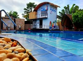 บ้านนกฮูกอิงไม้ ริมเล, vila v destinaci Ban Khlong Sai
