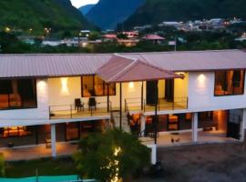 Casa vacacional Baños - Quédate donde el PRAA, hotel in Juivi