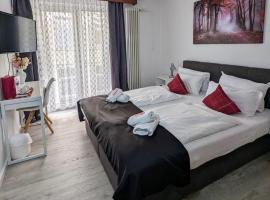 City Hotel - Doppelzimmer, hostal o pensión en Rastatt
