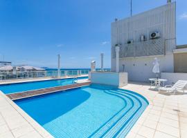 Predio nos Ingleses pe-na-areia com piscina - Aquarelle, hotel in Florianópolis