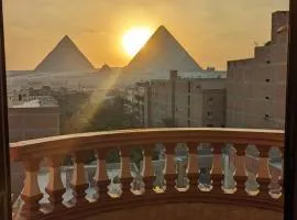 Apartment with a view of the pyramids