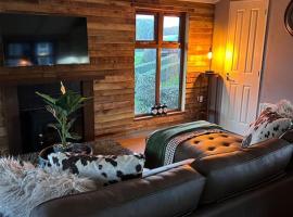 Woodside Lodge, Weybourne, Holt, chalet de montaña en Weybourne