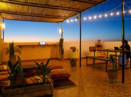 Monkey's Guest House - Appartement roof top terrasse privée vue sur mer, апартаменти у місті Tamraght Ouzdar